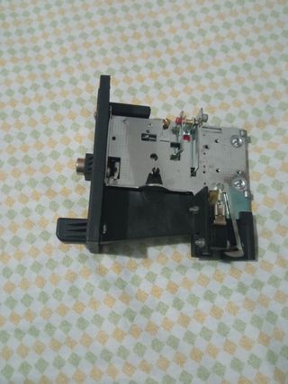 Monedero mecanico de 1€