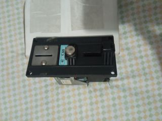 Monedero mecanico de 1€
