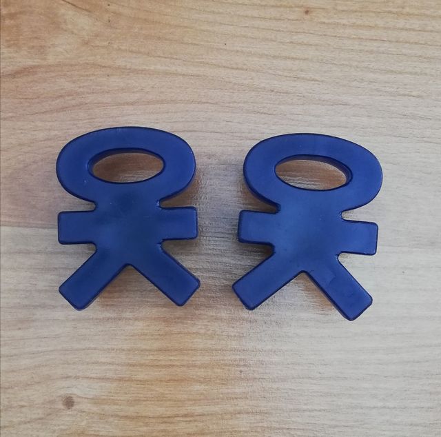 Tirador con figura de monigote.