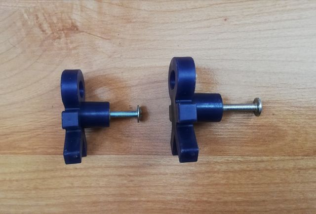 Tirador con figura de monigote.