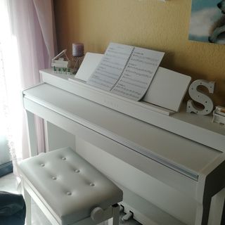 Classes de piano i música per nens/nenes 