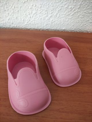Zapatos rosas de muñeca 