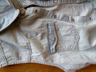 Camisa vaquera sin mangas para niña