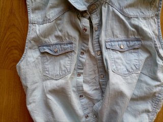 Camisa vaquera sin mangas para niña