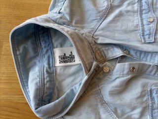 Camisa vaquera sin mangas para niña