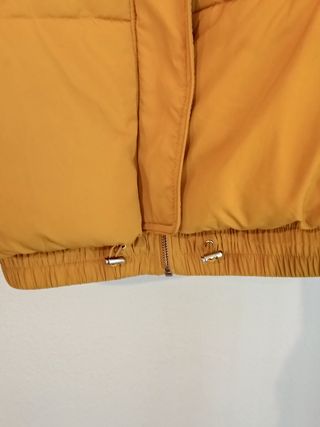 Plumifero oversize de Zara