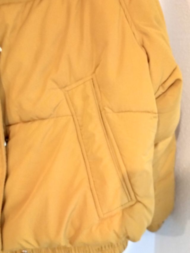 Plumifero oversize de Zara