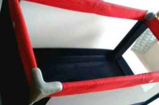 Cuna plegable de viaje.