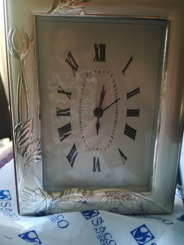 Orologio cornice argento nuovo