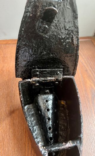 Antigua plancha de carbón