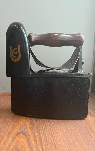 Antigua plancha de carbón