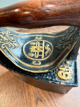 Antigua plancha de carbón