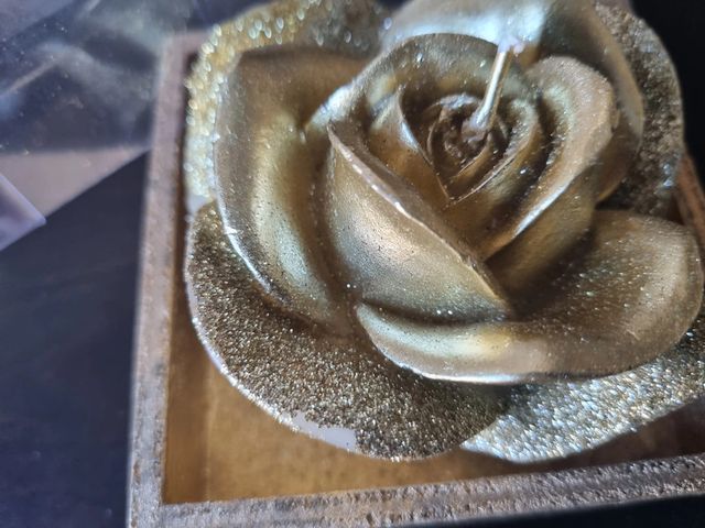 Candela rosa dorata con scatolina