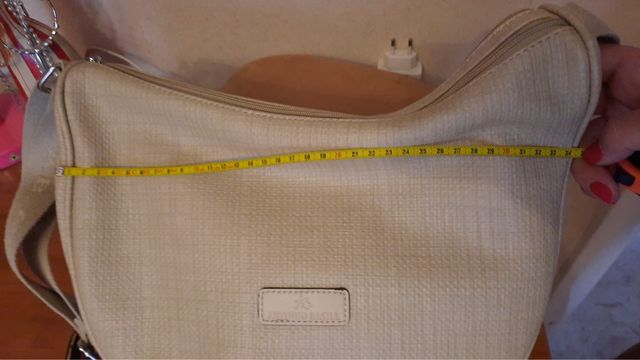 Borsa Mai Usata, in eco-pelle.