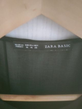 Blusa negra  de tirantes transparente 