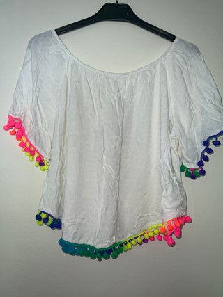 top blanco con pompones de colores L/XL