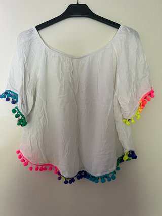 top blanco con pompones de colores L/XL