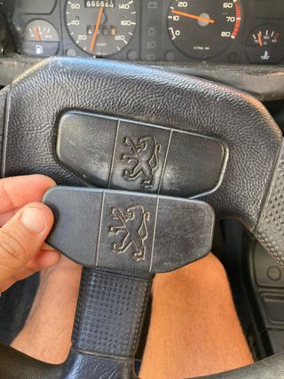 Insignia Volante Peugeot 205