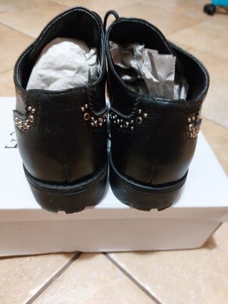 Scarpe nere stringate in pelle