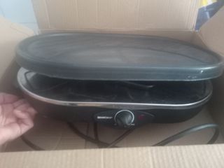 Plancha eléctrica  con accesorios, un solo uso