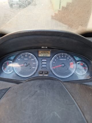 La moto honda  swing 125