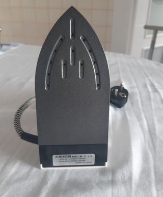 Plancha de viaje con vapor