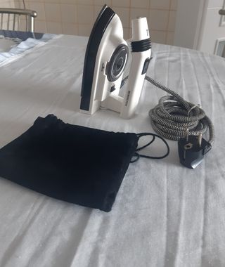 Plancha de viaje con vapor