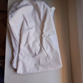 Almohada cuna +protector impermeable