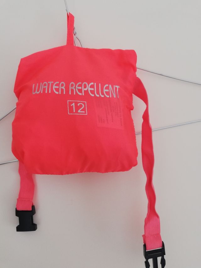 Kway rosa fluo richiudibile