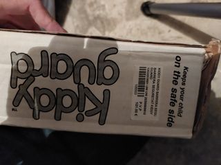 Barrera de seguridad enrollable para escalera.