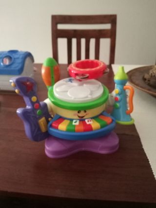 Batería  con música y luces guitarra trompeta