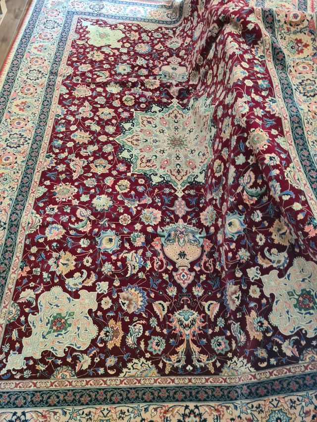 Tappeti persiani  annodati a mano con certificato