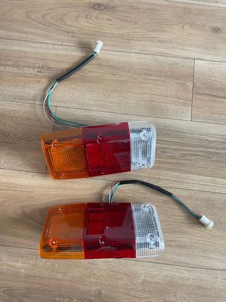 pareja de pilotos traseros nuevos patrol k160