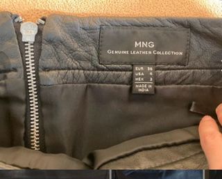 Minifalda negra de piel MANGO