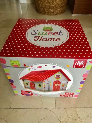 Casita de madera de juguete