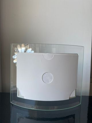 Cornice curva in vetro con dettagli argento