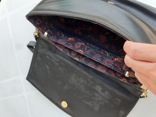 Pochette con tracolla nera vintage