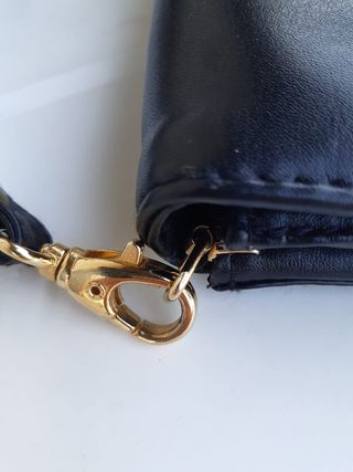 Pochette con tracolla nera vintage