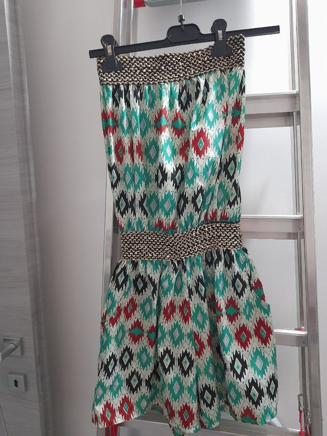 Tuta corta senza spalline