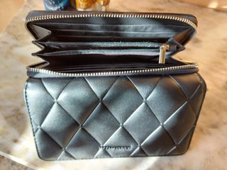 Billetera grande efecto piel.