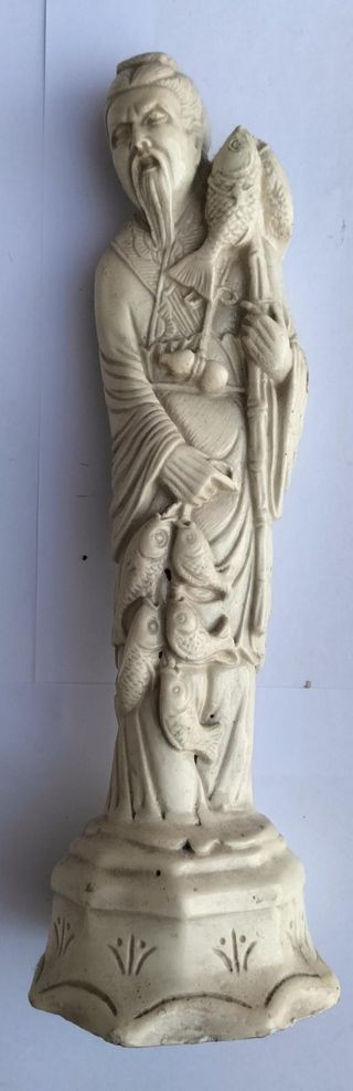 Estatua oriental antigua 
