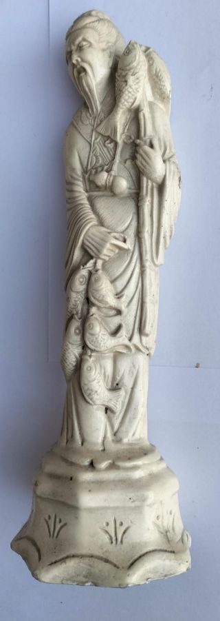 Estatua oriental antigua 
