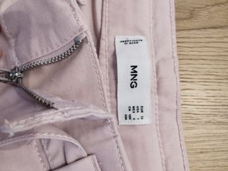 Pantalón color rosa-lila claro. Como nuevos.