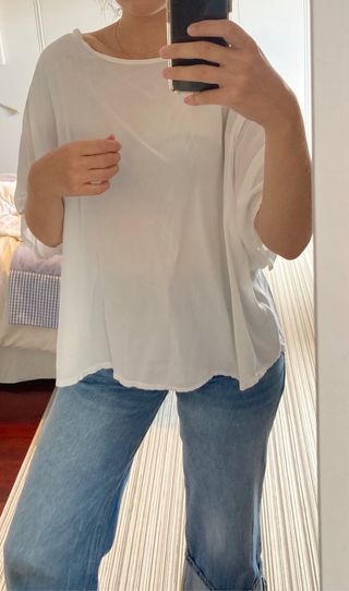 Blusa blanca escote espalda con bordados