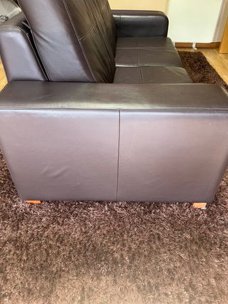 Sofá-cama tapizado en piel