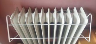 Lote 5€: 3 colgadores para radiador