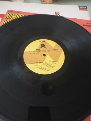 VINILO  HOMBRE RICO HOMBRE POBRE