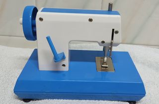 Maquina de coser Croqueta de juguete