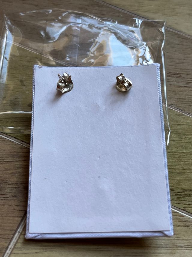 Conjunto de pendiente y colgante bebé