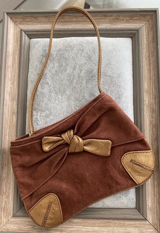 Cartera pequeña de piel